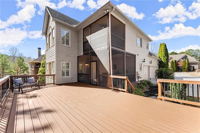 wooden terrace with a sunroom