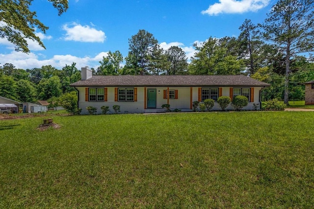 2089 Christian Cir SE, Conyers, GA 30013 - ranch-style house with a chimney and a front yard