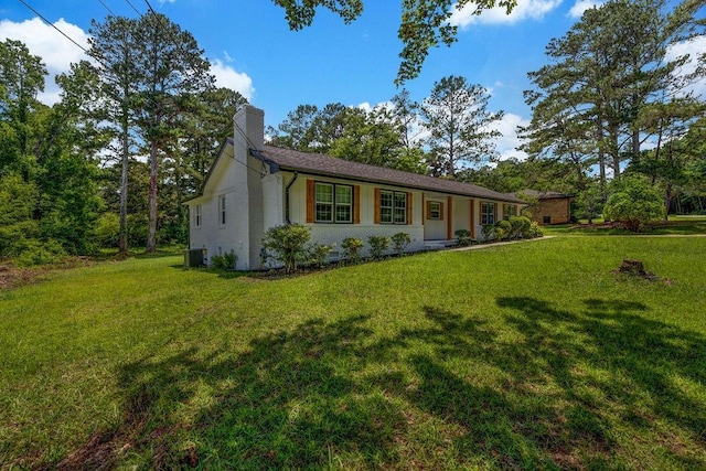 2089 Christian Cir SE, Conyers, GA 30013 - single story home featuring a chimney and a front lawn