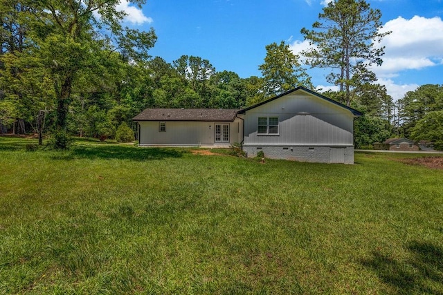 2089 Christian Cir SE, Conyers, GA 30013 - back of house featuring french doors, a yard, and crawl space