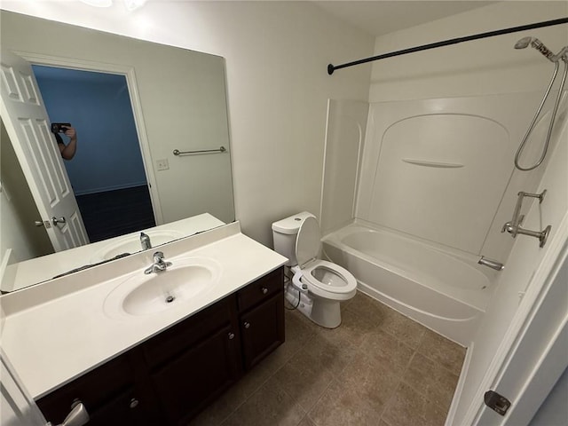 full bathroom with toilet, vanity, and shower / bath combination