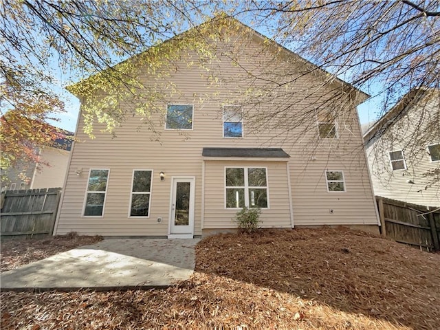 rear view of house with a patio