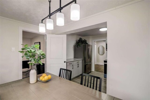 dining space featuring light hardwood / wood-style flooring