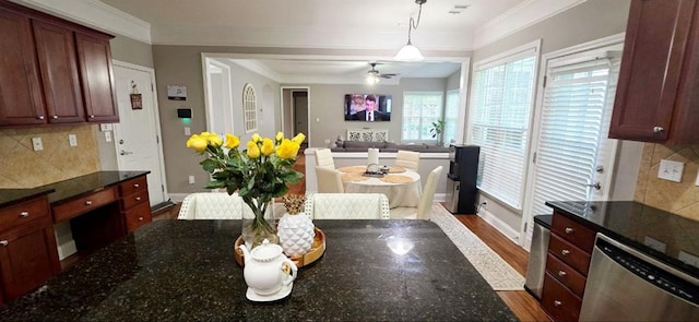 779 Avonley Creek Trce, Sugar Hill, GA 30518 - kitchen with dishwasher, decorative backsplash, ceiling fan, ornamental molding, and open floor plan