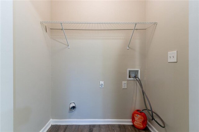 laundry room with hookup for an electric dryer, washer hookup, and dark hardwood / wood-style flooring