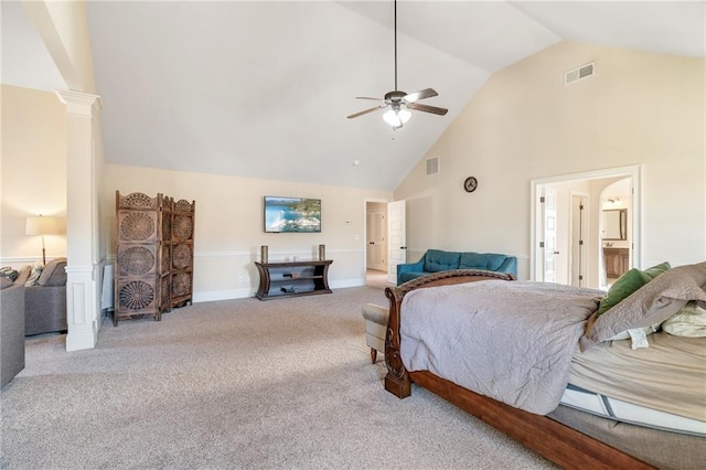 bedroom with visible vents, carpet floors, decorative columns, and high vaulted ceiling