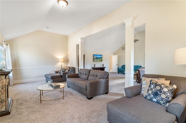 carpeted living room with visible vents, decorative columns, lofted ceiling, and baseboards