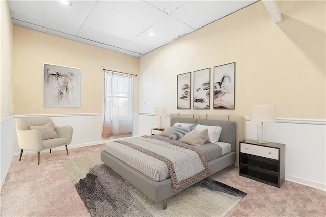 carpeted bedroom featuring baseboards and recessed lighting