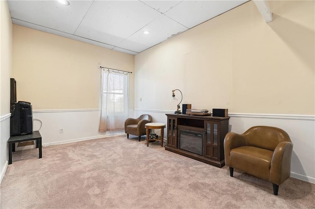 sitting room featuring recessed lighting and carpet