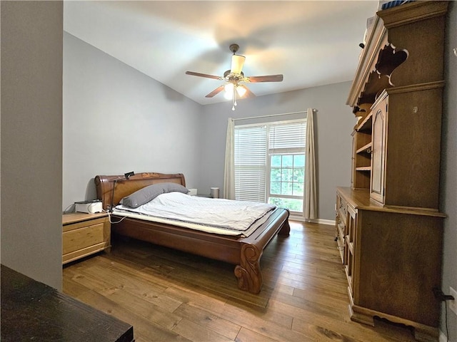 1988 Greensferry Gln, Lawrenceville, GA 30043 - bedroom with wood-type flooring and a ceiling fan