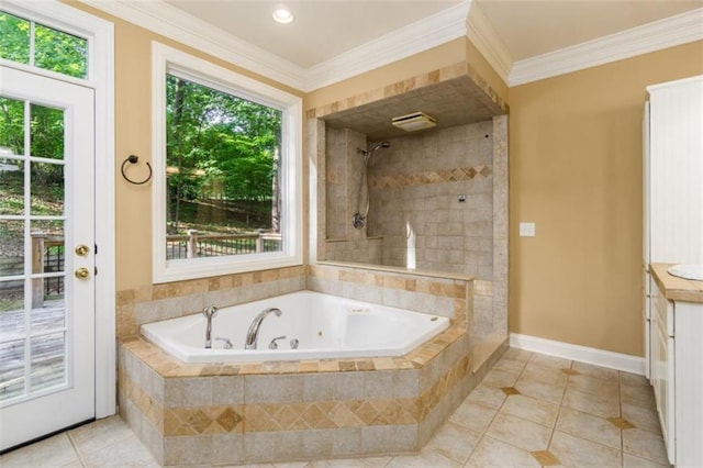 full bathroom with tile patterned floors, tiled shower, a tub with jets, vanity, and baseboards