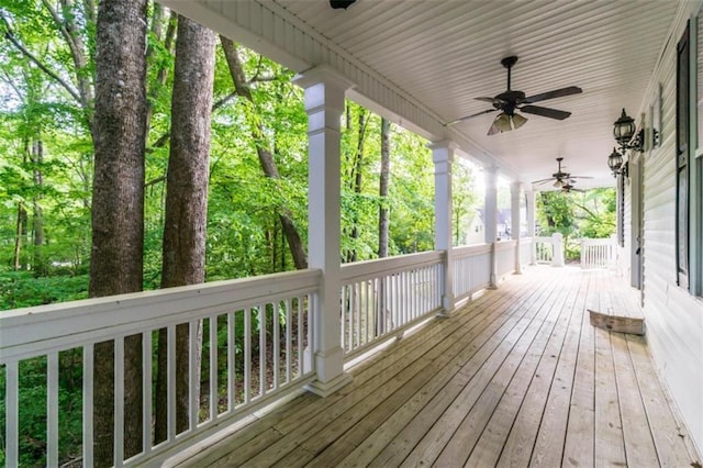 wooden deck featuring ceiling fan and covered porch
