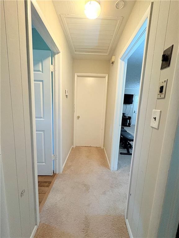 5167 Hiram Lithia Springs Rd, Powder Springs, GA 30127 - corridor with light colored carpet and baseboards