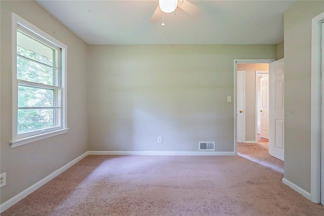 5167 Hiram Lithia Springs Rd, Powder Springs, GA 30127 - carpeted empty room featuring a ceiling fan and baseboards