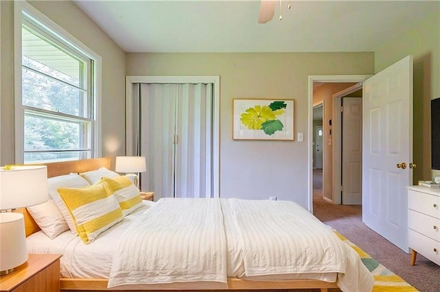 5167 Hiram Lithia Springs Rd, Powder Springs, GA 30127 - bedroom with light colored carpet and ceiling fan