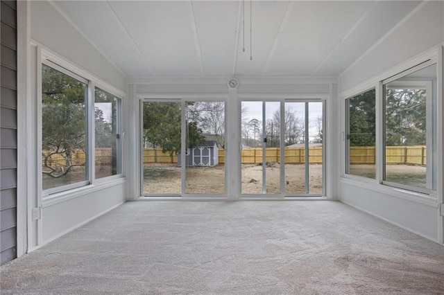 unfurnished sunroom featuring plenty of natural light