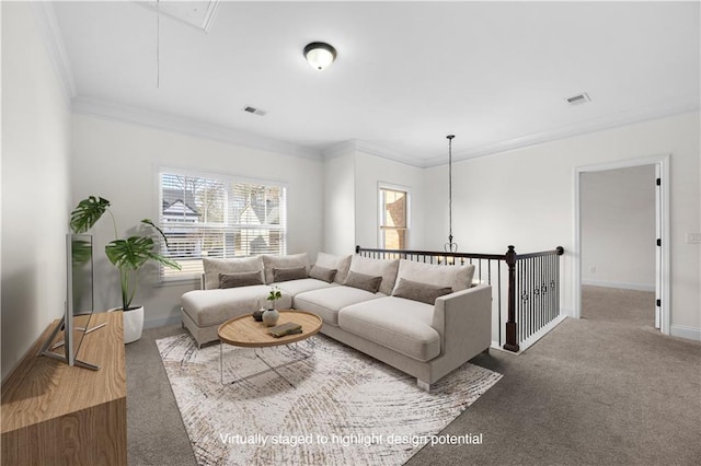 carpeted living room with ornamental molding