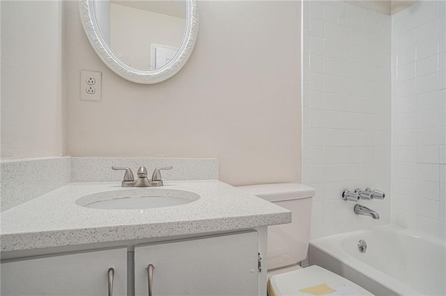 full bathroom with vanity,  shower combination, and toilet