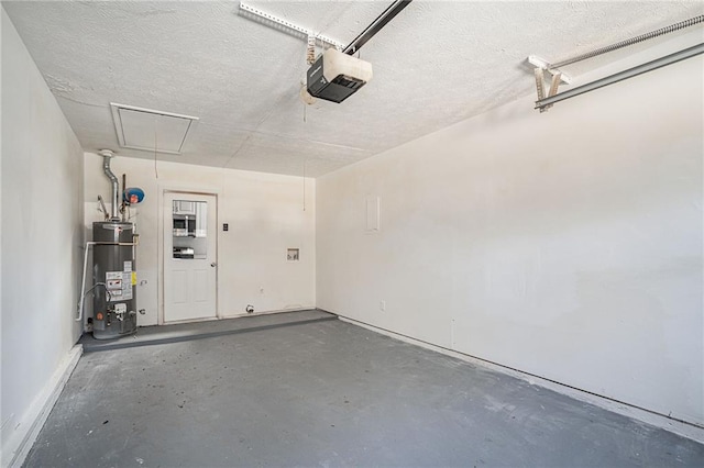 garage with gas water heater and a garage door opener