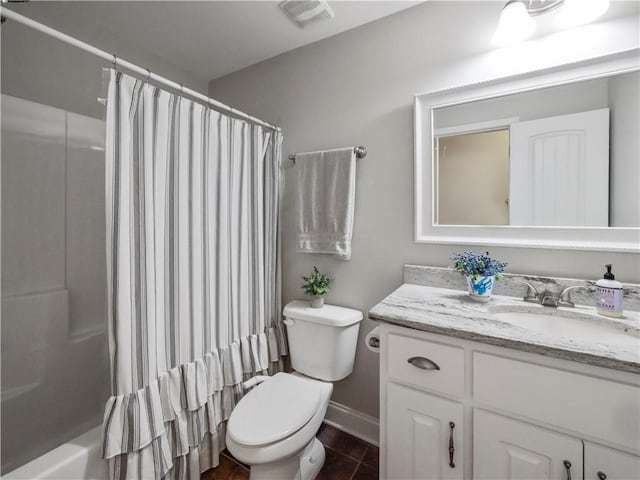 full bathroom with toilet, tile patterned flooring, vanity, and shower / bath combination with curtain