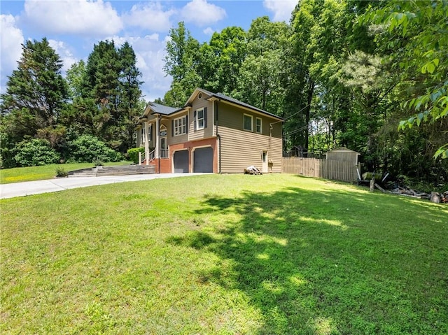 view of front of house with driveway and a garage