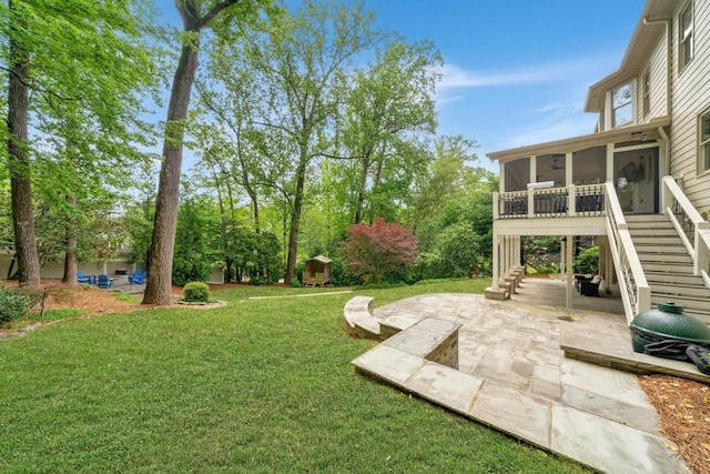 3925 Sheldon Dr NE, Atlanta, GA 30342 - view of green lawn with stairway, a sunroom, a patio, and view of scattered trees