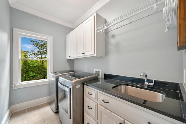 3925 Sheldon Dr NE, Atlanta, GA 30342 - washroom featuring cabinet space, independent washer and dryer, baseboards, light tile patterned flooring, and ornamental molding