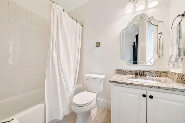 3925 Sheldon Dr NE, Atlanta, GA 30342 - bathroom with vanity, shower / bath combo with shower curtain, toilet, and tile patterned floors