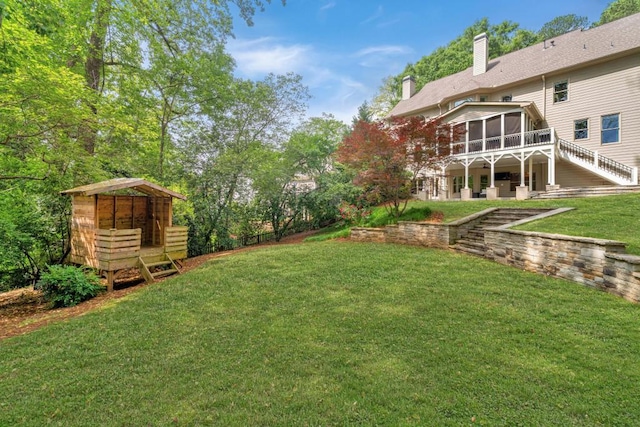 3925 Sheldon Dr NE, Atlanta, GA 30342 - view of green lawn featuring a sunroom and stairway