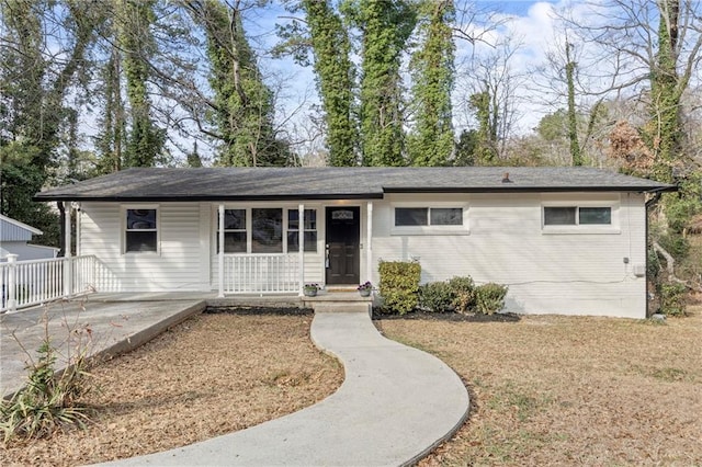 single story home featuring a porch