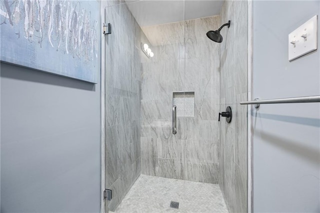 bathroom featuring an enclosed shower