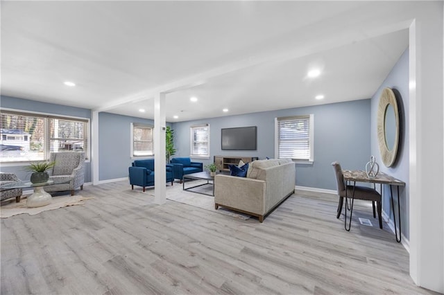 living room with light hardwood / wood-style floors