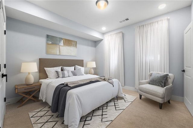 1048 Claudette Colvin Ct, Atlanta, GA 30318 - bedroom featuring visible vents, baseboards, recessed lighting, and light colored carpet