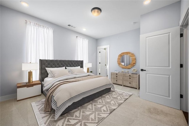 1048 Claudette Colvin Ct, Atlanta, GA 30318 - bedroom with visible vents, recessed lighting, and light carpet