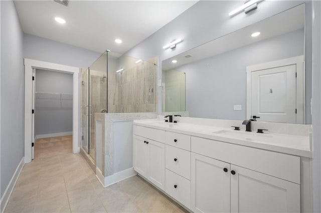 1048 Claudette Colvin Ct, Atlanta, GA 30318 - full bathroom with a sink, double vanity, a stall shower, and recessed lighting