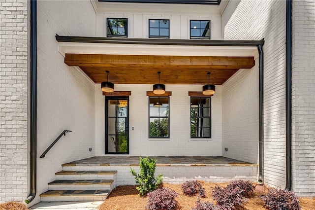 doorway to property with covered porch