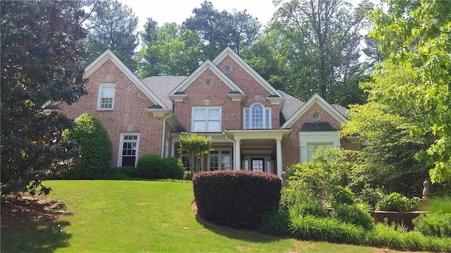 view of front of home with a front yard