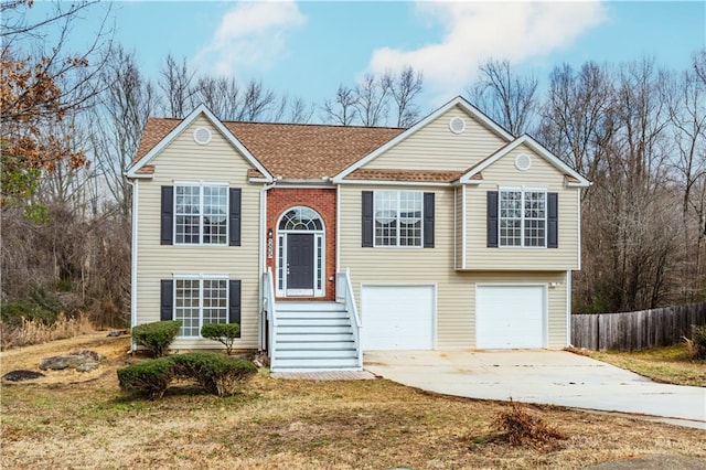 bi-level home featuring a garage