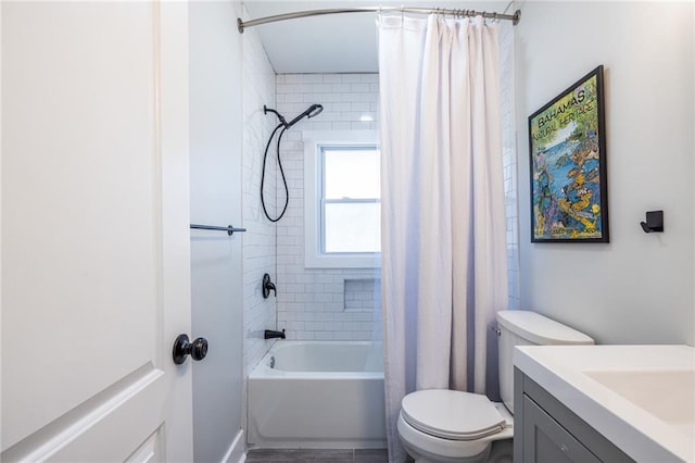 bathroom with toilet, shower / bathtub combination with curtain, and vanity