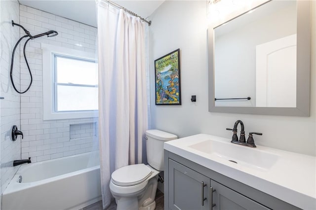 bathroom with vanity, toilet, and shower / bathtub combination with curtain