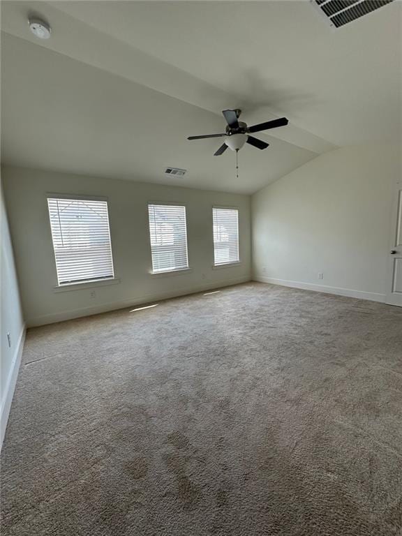 carpeted spare room with ceiling fan