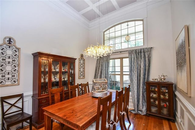 4742 Thunder River Dr, Gainesville, GA 30506 - dining area with a towering ceiling, coffered ceiling, wood finished floors, beamed ceiling, and ornamental molding