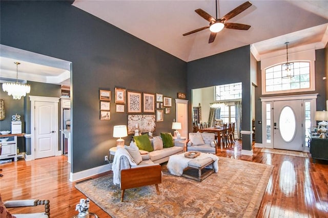 4742 Thunder River Dr, Gainesville, GA 30506 - living area featuring high vaulted ceiling, ceiling fan, hardwood / wood-style flooring, and a chandelier