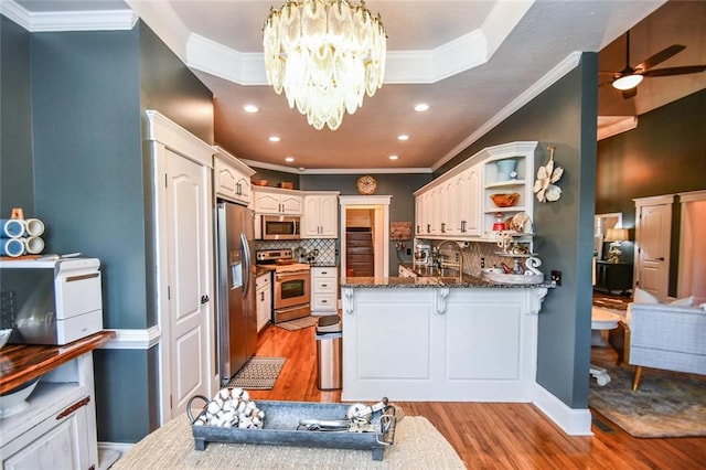 4742 Thunder River Dr, Gainesville, GA 30506 - kitchen with stainless steel appliances, a peninsula, light wood finished floors, open shelves, and ornamental molding