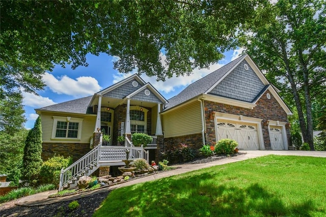 4742 Thunder River Dr, Gainesville, GA 30506 - craftsman house with stone siding, a front lawn, a porch, a garage, and concrete driveway