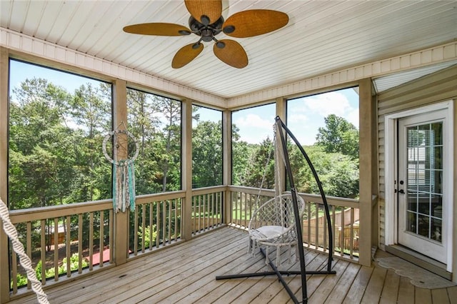 4742 Thunder River Dr, Gainesville, GA 30506 - unfurnished sunroom featuring ceiling fan and view of scattered trees