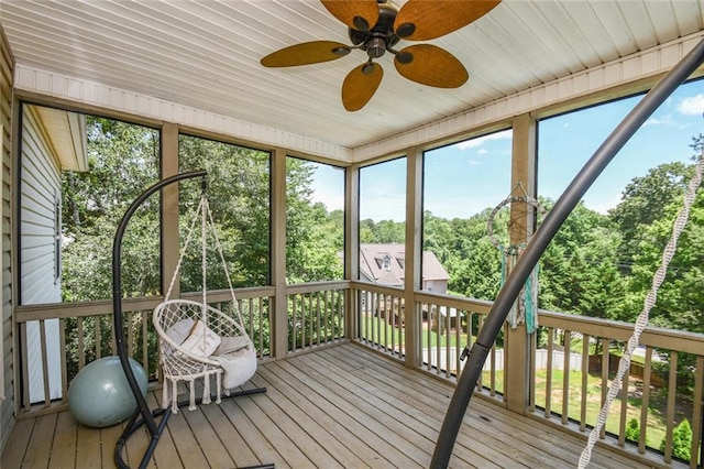 4742 Thunder River Dr, Gainesville, GA 30506 - unfurnished sunroom with ceiling fan and view of scattered trees