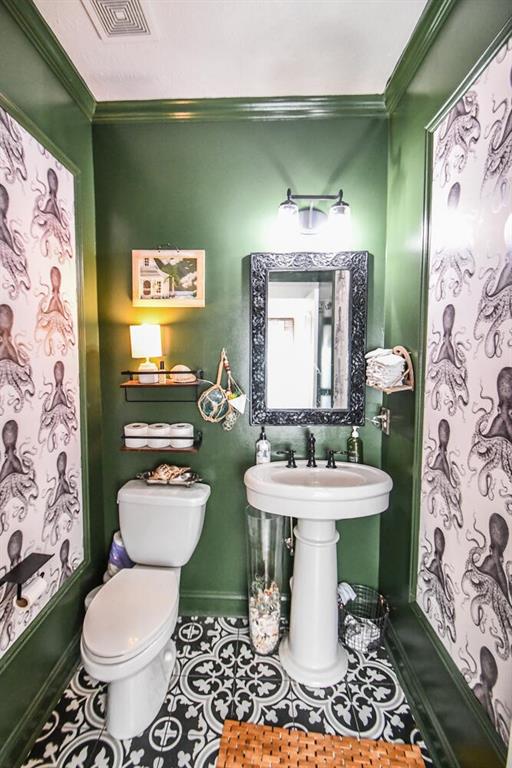 4742 Thunder River Dr, Gainesville, GA 30506 - bathroom with ornamental molding and tile patterned flooring