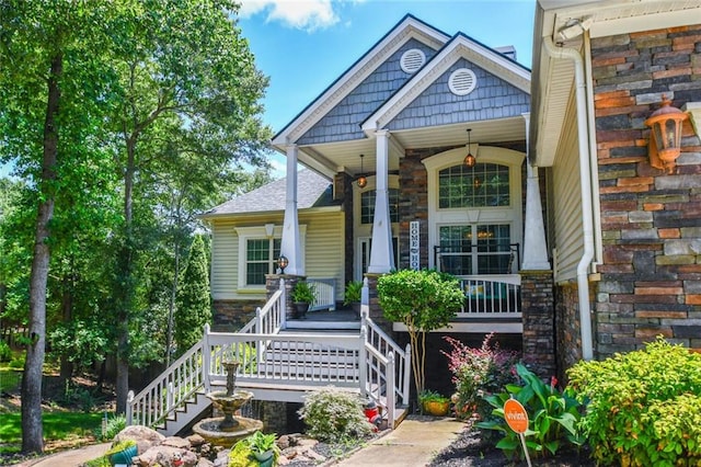 4742 Thunder River Dr, Gainesville, GA 30506 - view of front of property with covered porch, stairs, and stone siding
