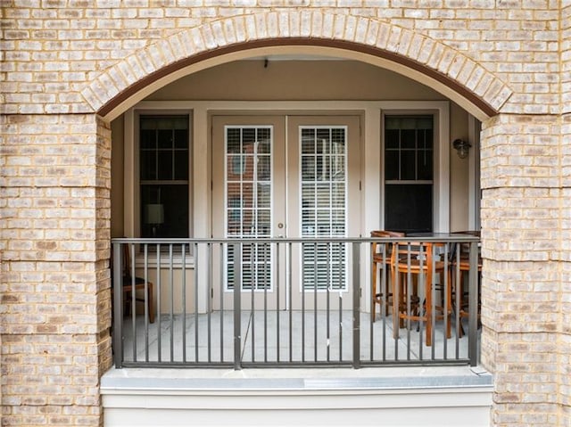 doorway to property featuring french doors